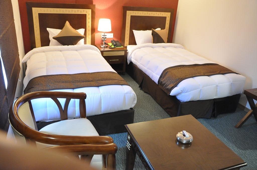 Silk Route Otel Guwahati Oda fotoğraf