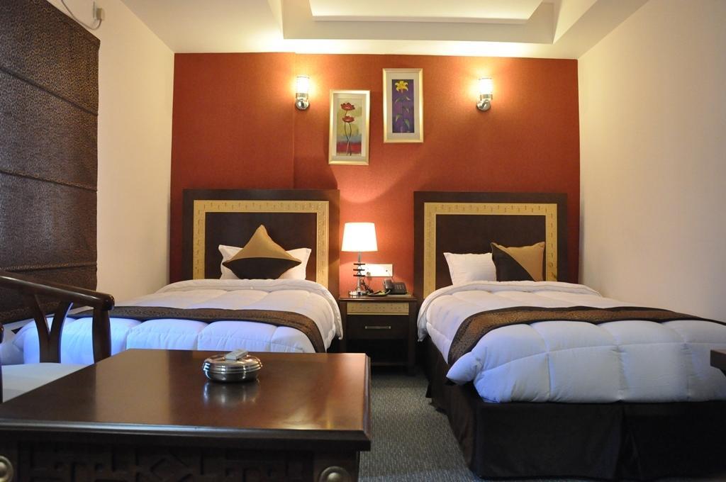 Silk Route Otel Guwahati Oda fotoğraf